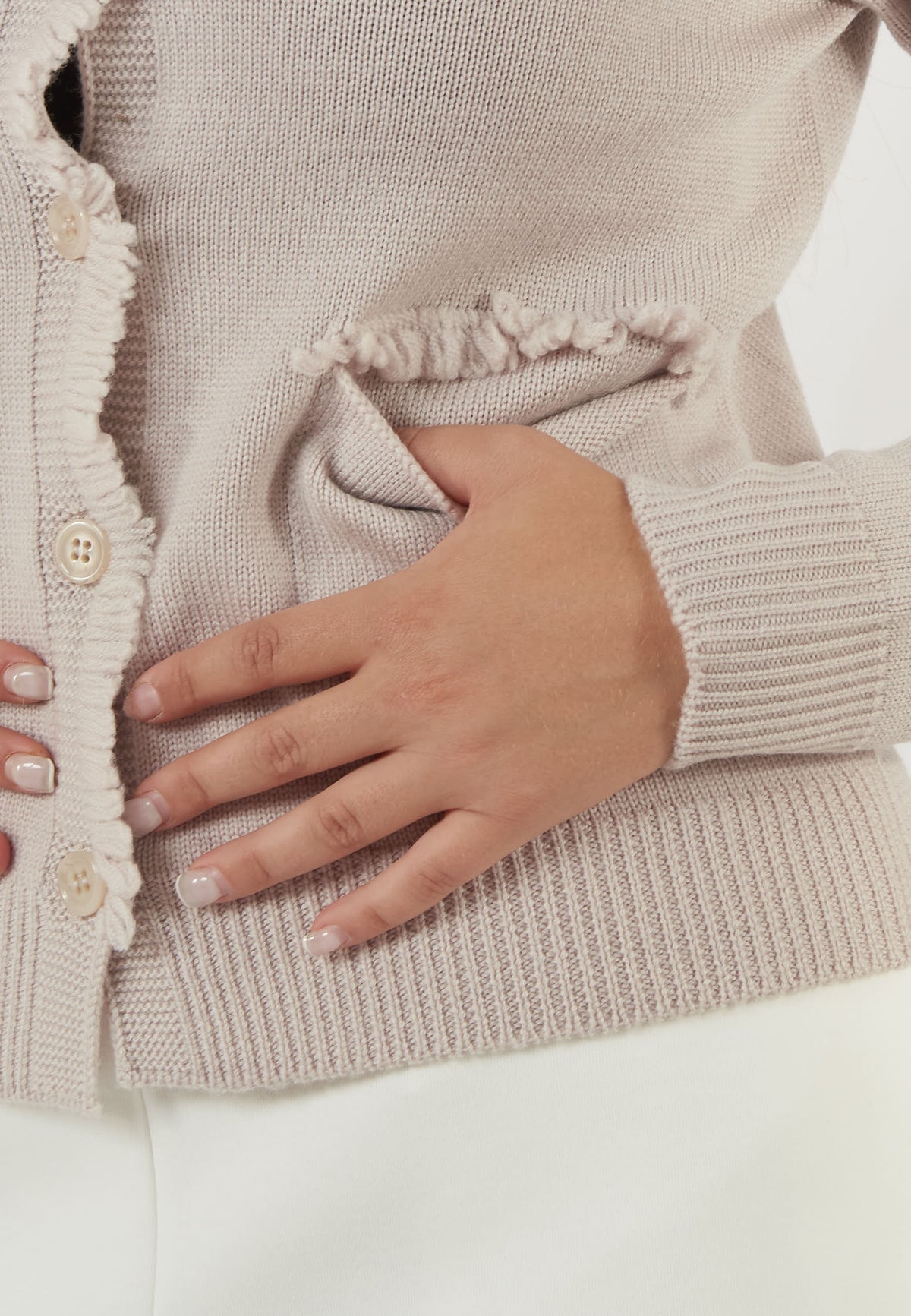 CARDIGAN IN LANA BEIGE CON VOLANT