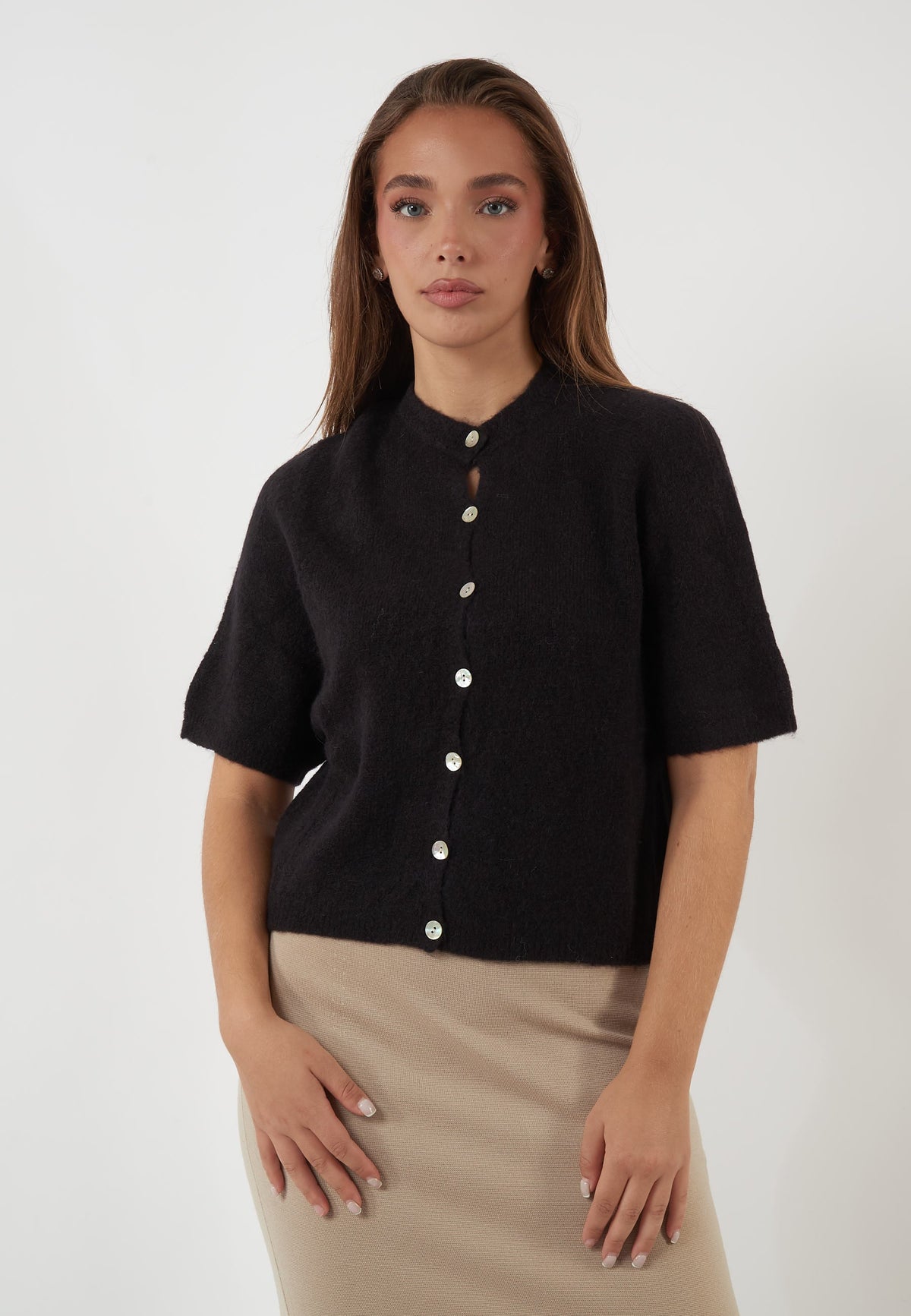 CARDIGAN A MANICHE CORTE NERO