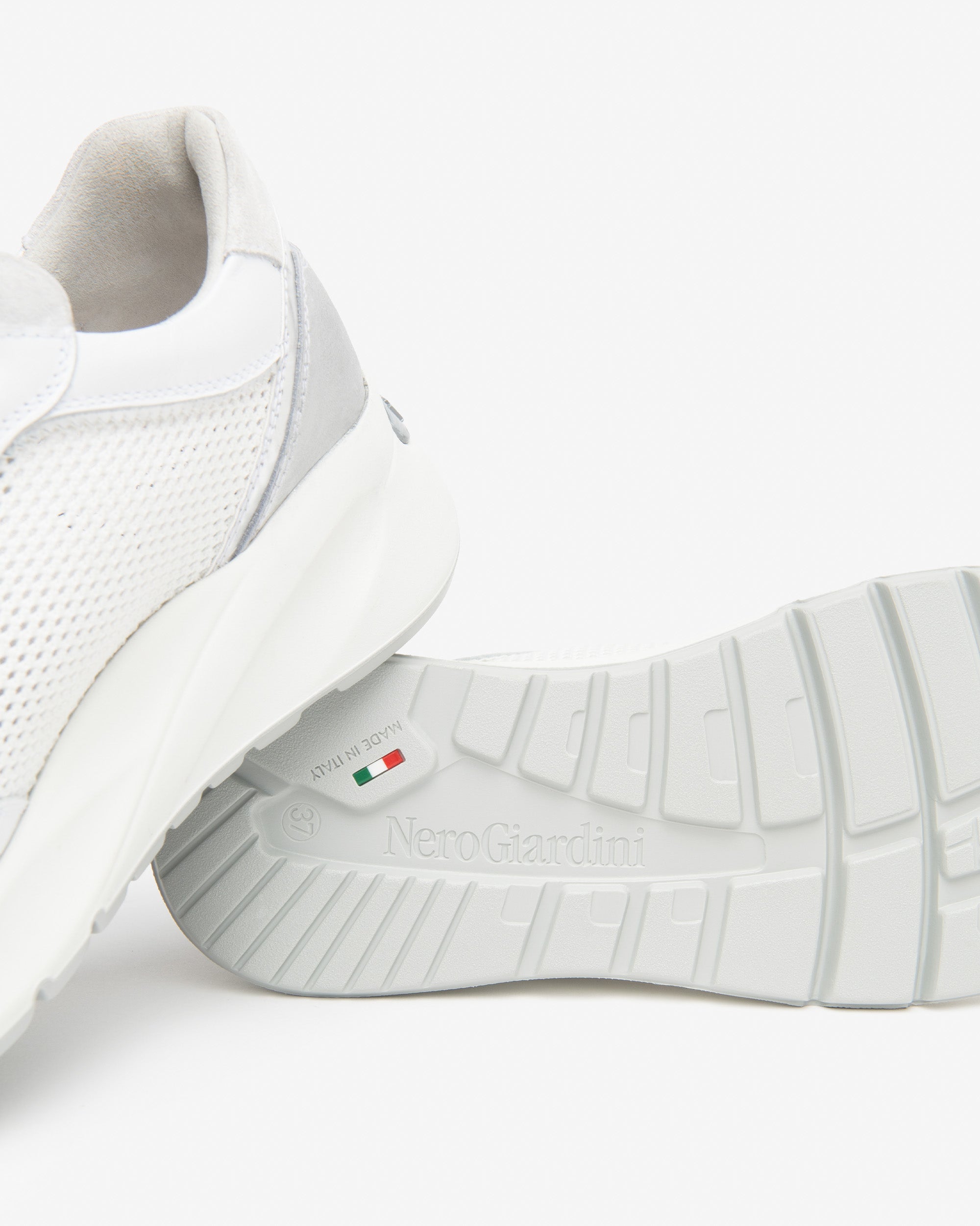 Nero Giardini  Sneakers da donna in pelle, tela e materiale tecnico E615180D 707 Bianca
