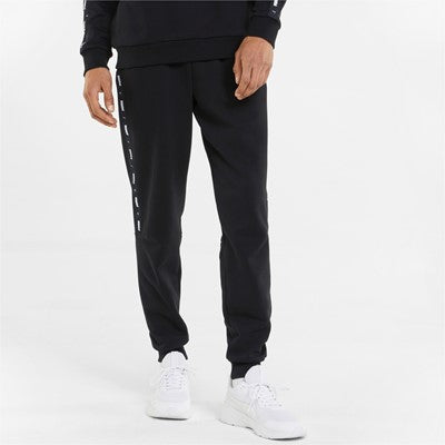 Puma sweatshirt pants with side stripe and cuff at the bottom ESS+ Tape Sweatpants FL cl 849042 01 black