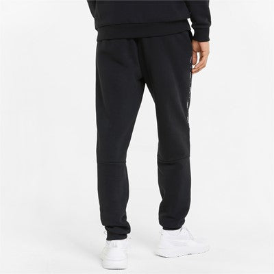Puma sweatshirt pants with side stripe and cuff at the bottom ESS+ Tape Sweatpants FL cl 849042 01 black