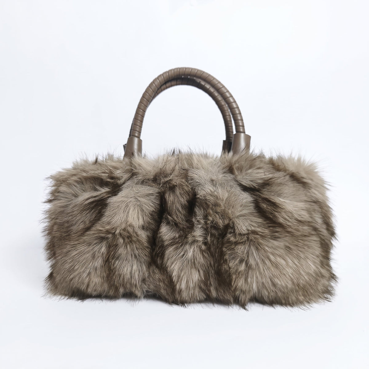 Tecla Borsa Pelosa con due manici intrecciati a tracolla regolabile